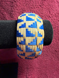 APO 70: Raufara and ribbon barrel bracelet