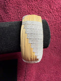 APO 72: Raufara and ribbon barrel bracelet