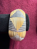 APO 28: Raufara and ribbon barrel bracelet
