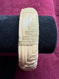 APO 61: Raufara and ribbon barrel bracelet