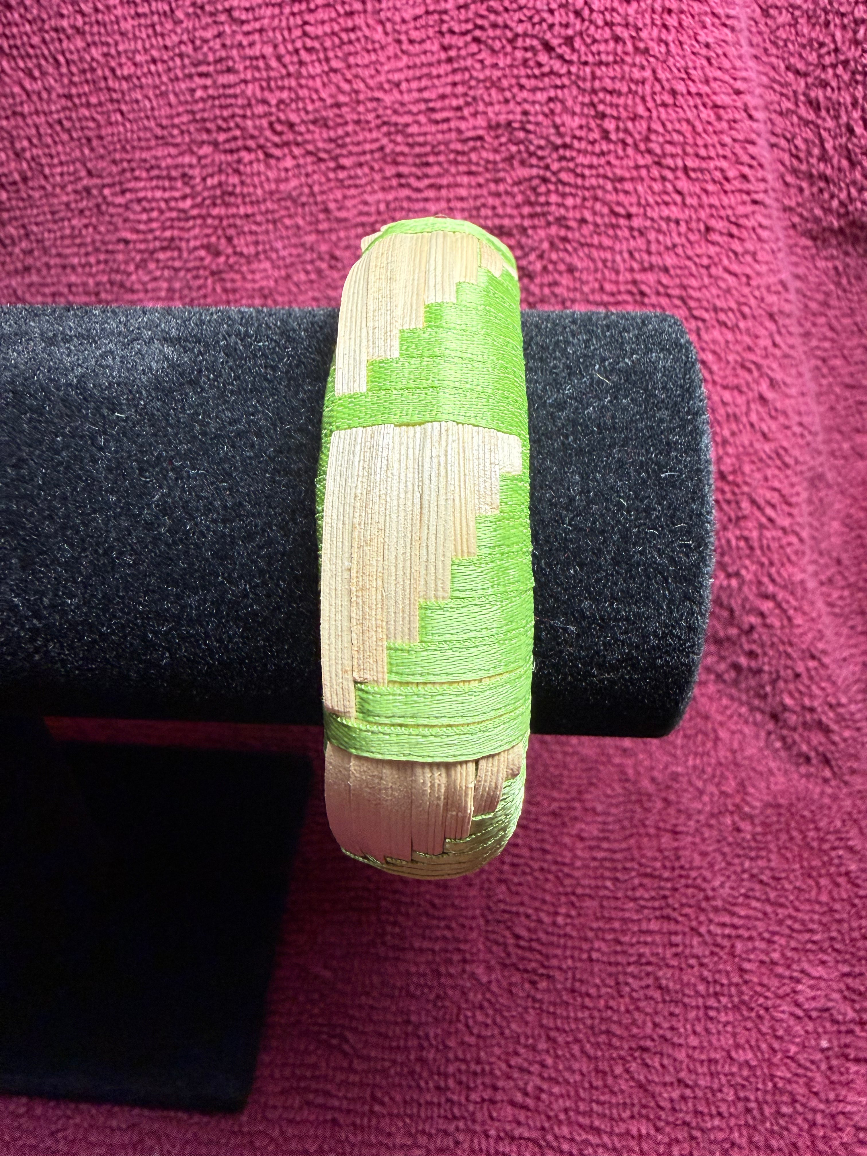APO 63: Raufara and ribbon barrel bracelet