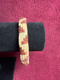 APO 0053: Raufara and ribbon barrel bracelet